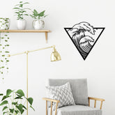Waves metal wall art in Texture Black hung above a sofa in a living room, 60x56cm
