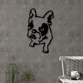 Dogo metal wall art in Texture Black hanging above a sofa in a living room, 32x54cm