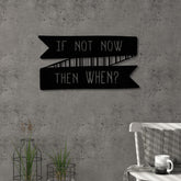 Now! metal wall art in Texture Black, 55x30cm, displayed on a living room wall