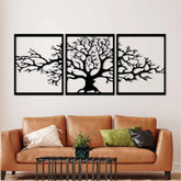 Triptych Platanus Metal Wall Art (74cm) in Texture Black, hung above a sofa