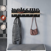 Welcome Hallway Coat Hanger Rack styled in a hallway