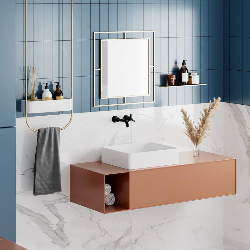 Corner Modern Design Mirror in Gold, hung on a wall