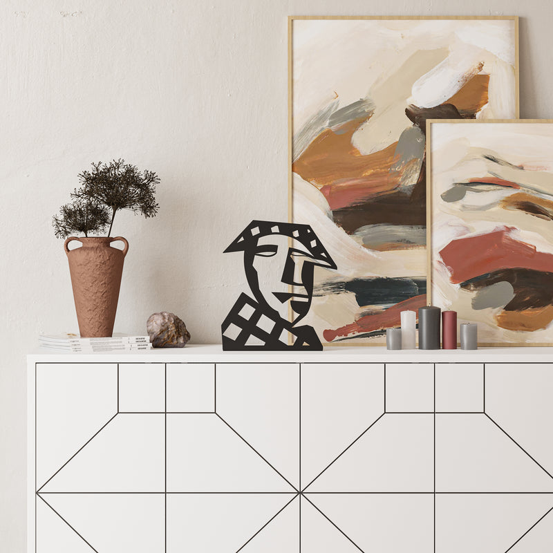 Max Decorative Object in matte black, abstract face silhouette design