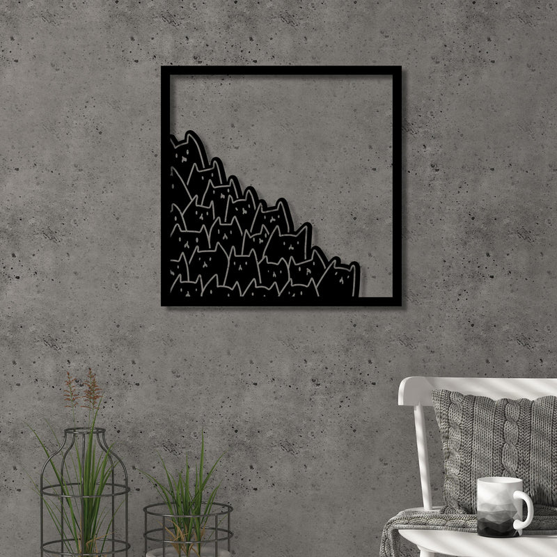 Meow metal wall art in Texture Black hanging above a sofa in a living room, 49x49cm