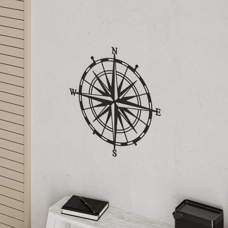 Close-up detail of the compass rose design on the Compass metal wall art, 45cm diameter