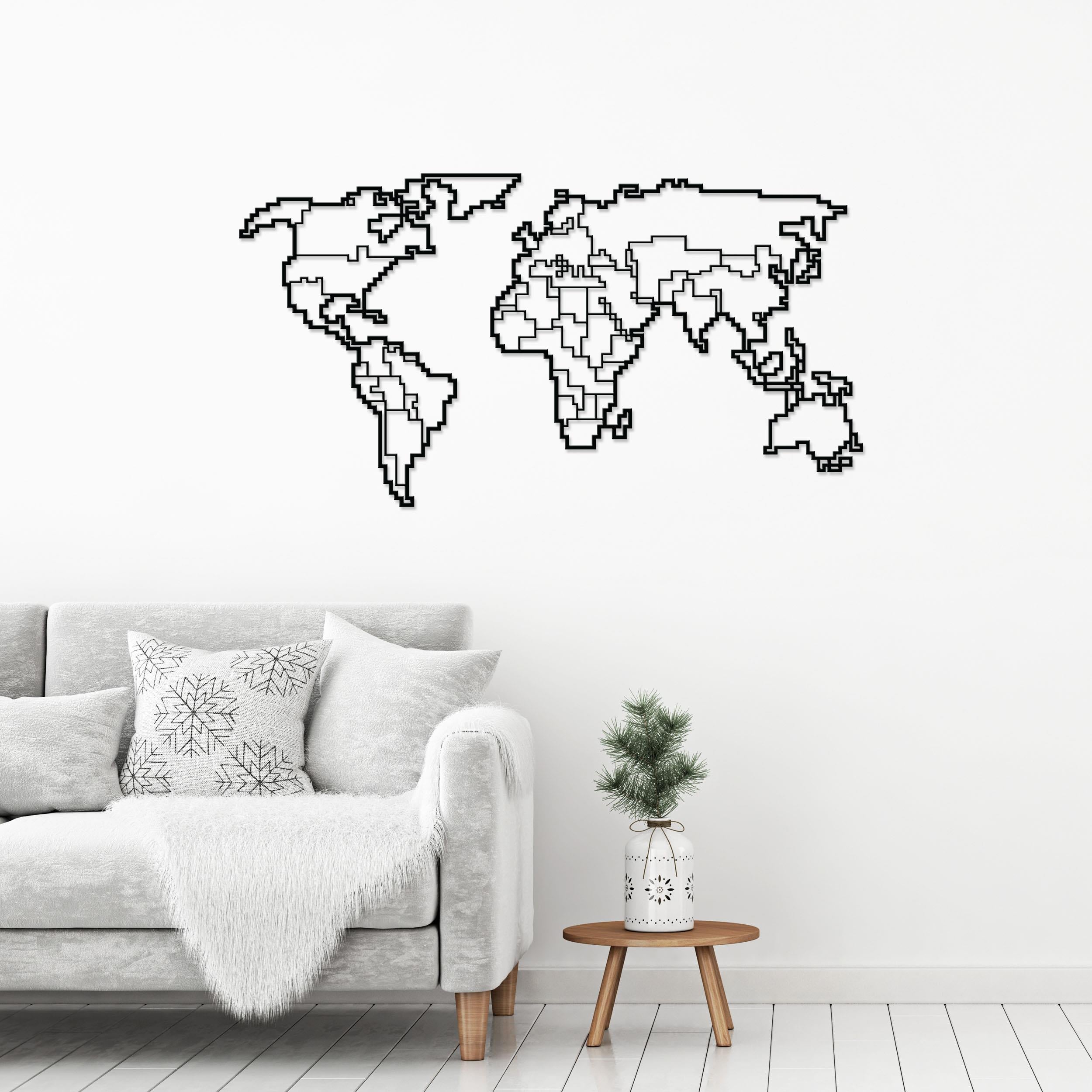 World Map metal wall art, 100x52cm, hung above a desk in a study