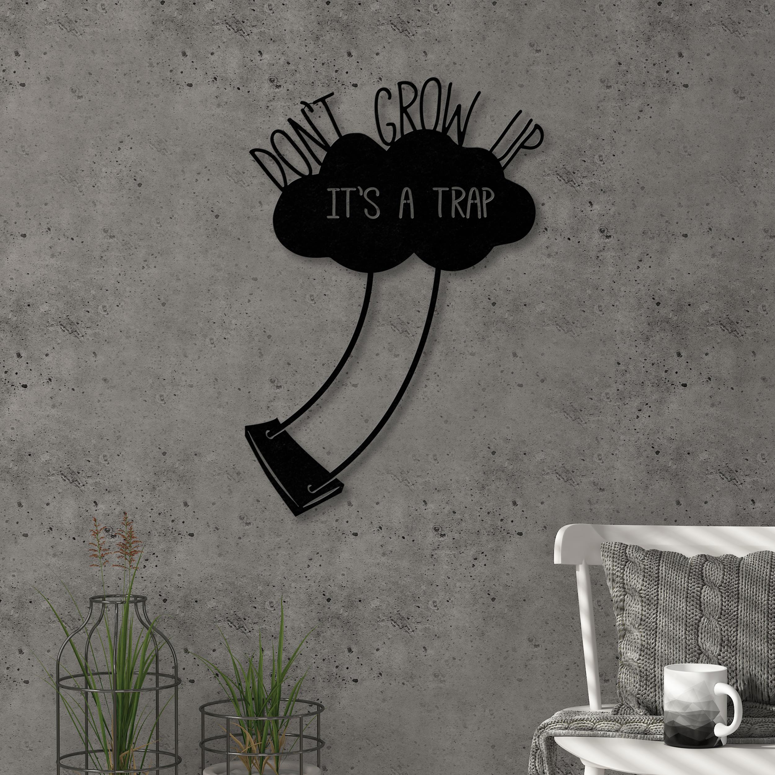Don't Grow Up metal wall art in Texture Black, 35x51cm, hero product shot