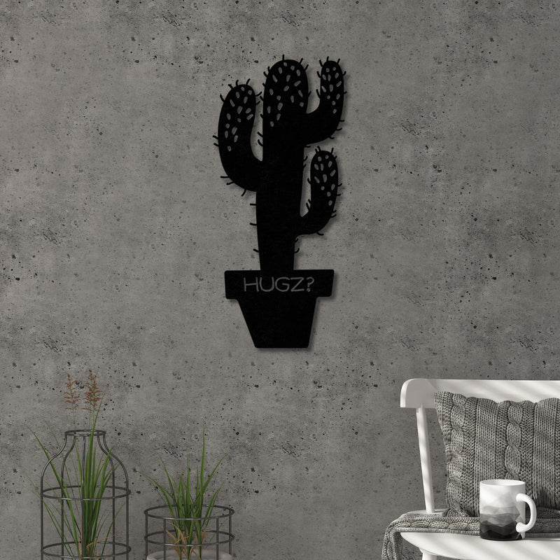 Hugz metal wall art in Texture Black, 22.5x49cm, displayed on a living room wall