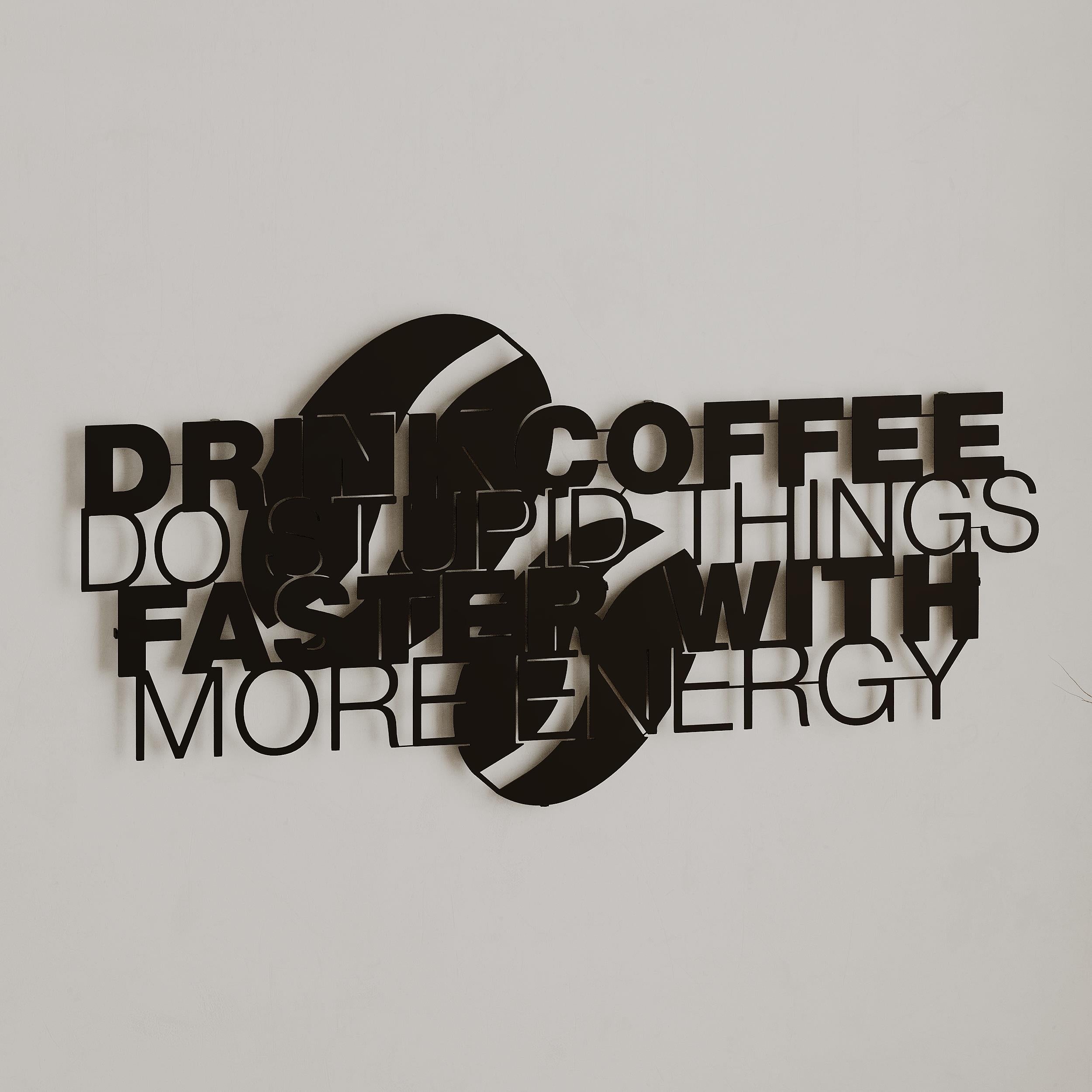 Close-up detail of the coffee cup motif on the Coffee For More Energy metal wall art