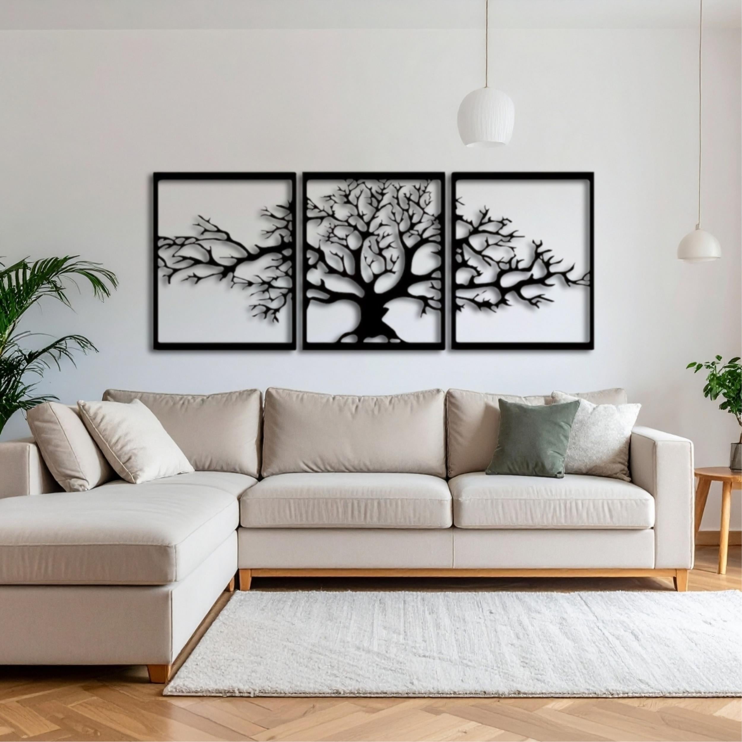 Triptych Platanus metal wall art, 144x60cm, hung above a sofa in a living room