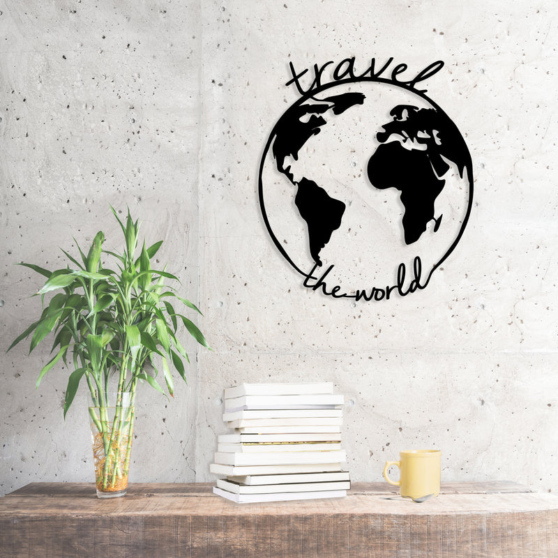 Metal Wall Art Travel the World in Black, hung on a living room wall