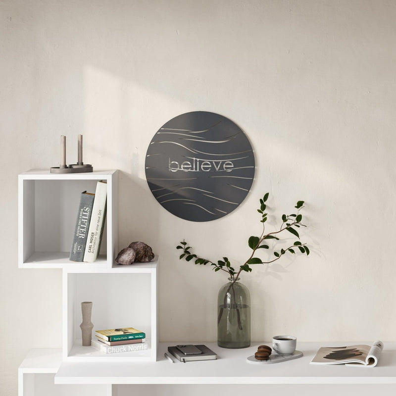 Believe Metal Wall Art in Black, circular "believe" typography design